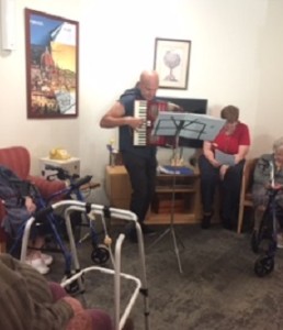 Nazario Vocale playing the Accordian